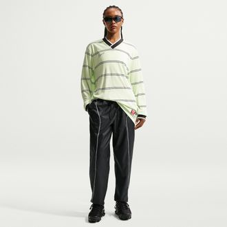 Nike Womens Nike Sportswear Mid-Rise Repel Woven Pants in Black | IM8483-010
