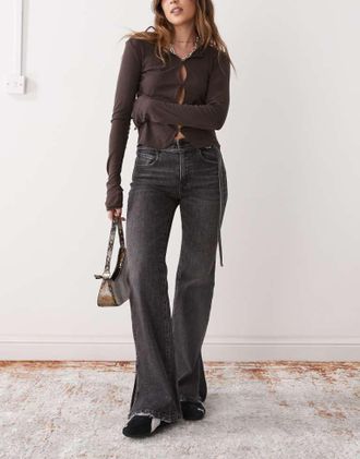 Miss Sixty Womens flared denim jeans in washed black with hem splits - Size Large