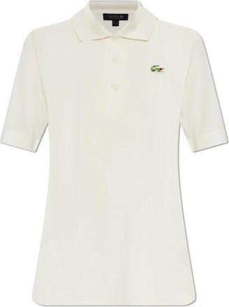 Lacoste Runway Slim Fit Polo van zijde met kralen en krokodil - Dames - Polos - Beige - XS - Leer - Tops