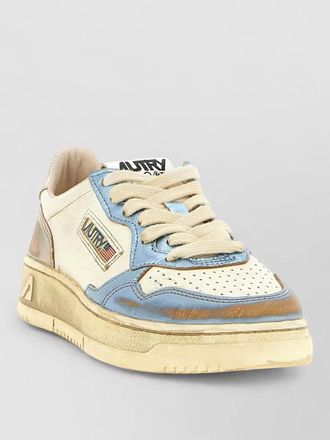 Autry medalist low sneakers perforated toe panels rubber