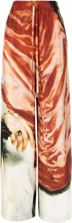 Alexander McQueen Pantaloni con stampa - Rosso