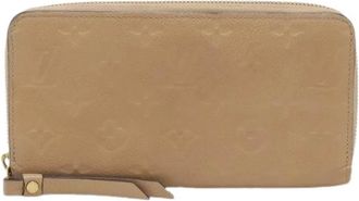 Louis Vuitton Pre-owned Wallets, female, Beige, Size: ONE SIZE Pre-owned Monogram Empreinte Zippy Wallet