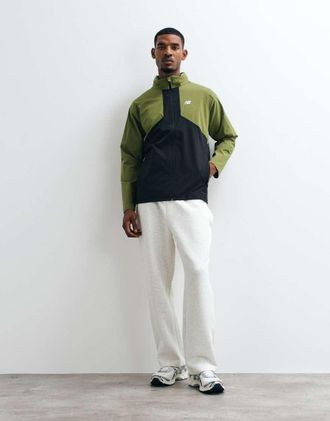 New Balance giacca utility in tessuto elasticizzato verde sport