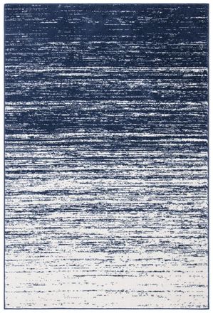 Safavieh Alfombra ombre moderno de polipropileno azul/blanco, 135 x 196 cm