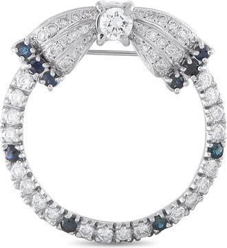 Luxury Bazaar Vintage Platinum 1.50ct Diamond and Sapphire Open Circle Bow Brooch MF01-062426