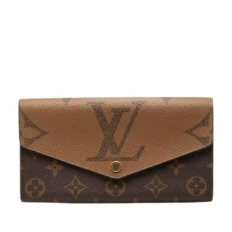 Louis Vuitton Pre-owned Long wallet (bi-fold) - Dames - Pre-owned - Bruin - Maat: ONE Size Zijde