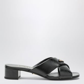 Prada Mules nere in pelle con triangolo logo