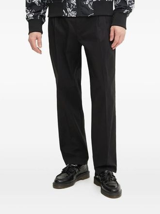 Versace Jeans Couture logo-appliqué pleat-detail trousers - Black