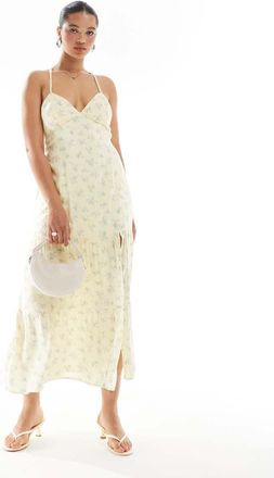 Hollister Vestito lungo giallo con stampa a fiorellini, schiena scoperta e spacco sulla coscia