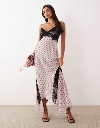 AFRM Vince - Vestito midi in rete rosa a pois con incrocio sul retro e dettaglio in pizzo