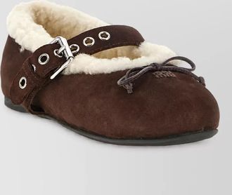 Miu Miu sheepskin slippers