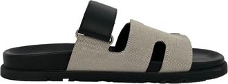 Herm&egrave;s Herm&egrave;s Chypre sandalen in wit en zwart canvas en leer