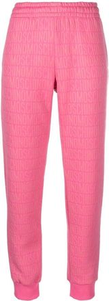 Moschino logo-print track pants - women - Cotton/Polyester - 44 - Pink