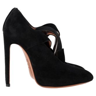 Alaia Buckled Strap Pumps in Black Suede