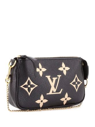 Louis Vuitton Pochette Accessoires Bicolor Monogram Empreinte Giant Mini clutch bag - Zwart