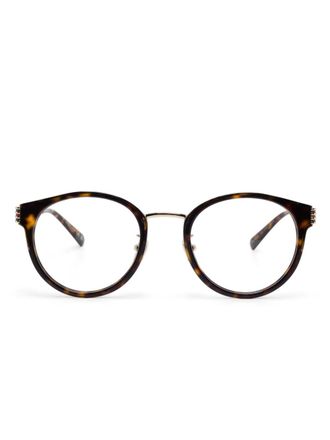 Gucci Occhiali da sole tondi con effetto tartarugato - Marrone