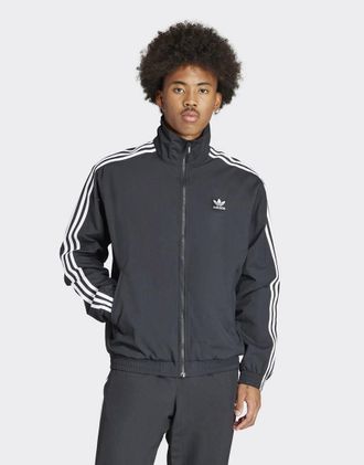 adidas Originals woven Firebird zip through track top in black