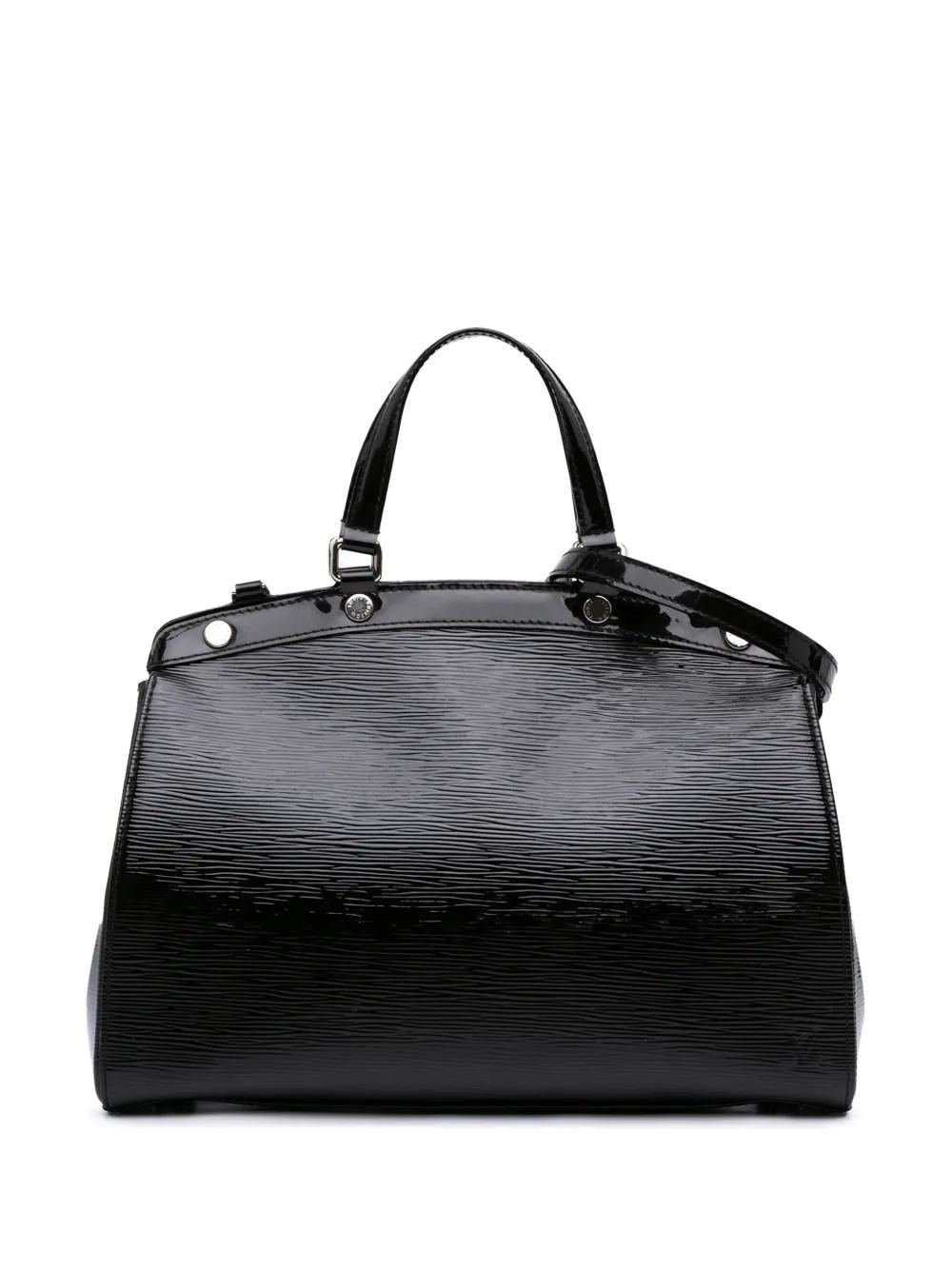 Louis Vuitton: Black Bags now up to −45% Stylight