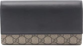 Gucci Portafoglio bi-fold GG Supreme - Nero