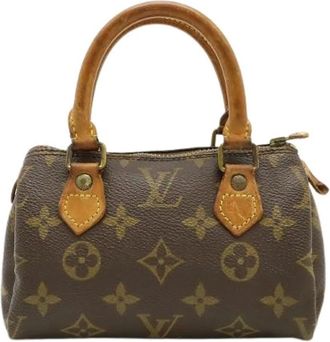 Louis Vuitton Pre-owned Mini Bags, female, Brown, Size: ONE SIZE Pre-owned Canvas Mini Bag