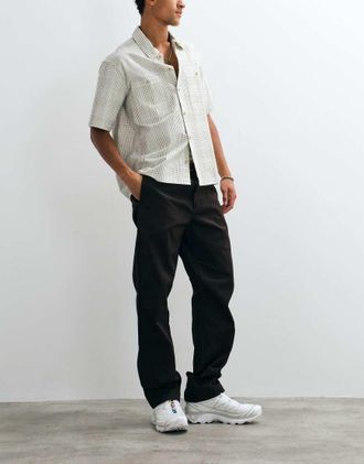 Carhartt Work in Progress Master pantaloni relaxed tapered fit marroni-Marrone