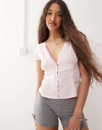 Motel Ilias - Top a corsetto rosa pallido