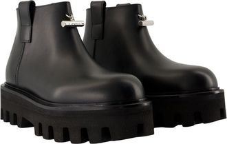 Alexander McQueen Womens Chunky Lug-Sole Leather Ankle Boot Black Calfskin