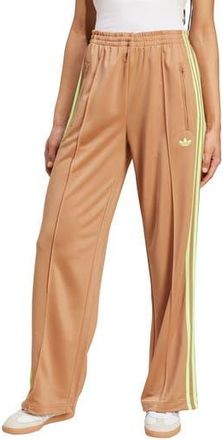 adidas Originals Adicolor Classic Firebird Loose Fit Recycled Polyester Track Pants in Cardboard/Signal Green at Nordstrom Rack, Size X-Large