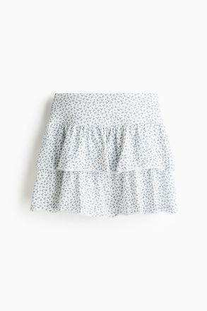 H&M Mini-Stufenjupe aus Jersey - Weiss/Gebl&uuml;mt