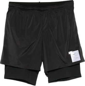 SATISFY Layered Logo-print Shorts