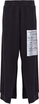Maison Margiela numbers-motif flared trousers - Black