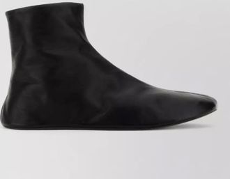 The Row leather shearling-lined ankle boots
