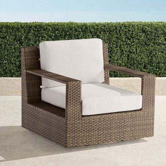 Frontgate St. Kitts Swivel Lounge Chair with Cushions in Light Kona Wicker - Sunbrella Rain, Rain Sailcloth Sailor - Frontgate