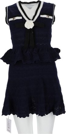 Self Portrait Textured Knit Mini Dress With Ruffled Peplum And Bow Detail