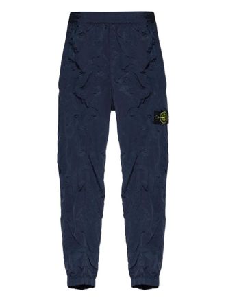 Stone Island logo-patch track pants - men - Polyamide - 31 - Blue