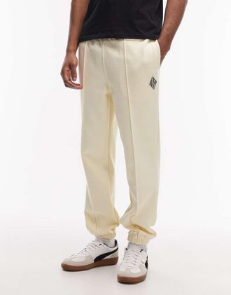 Lacoste Pantaloni della tuta gialli con logo-Neutro