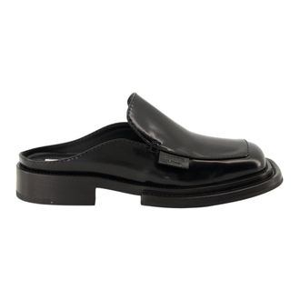 Moschino Leren Muiltjes- Elegant en Comfortabel - Dames - Slip ons - Zwart - 37 1/2 EU - Schoenen