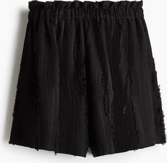 H&M Paperbag-Shorts mit Fransen - Schwarz