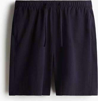 H&M Knielange Pikeeshorts in Relaxed Fit - Blue