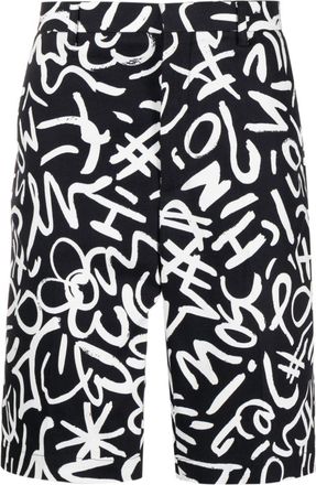 Moschino monogram-print chino shorts - men - Cupro/Acetate/Elastane/Cotton - 46 - Black