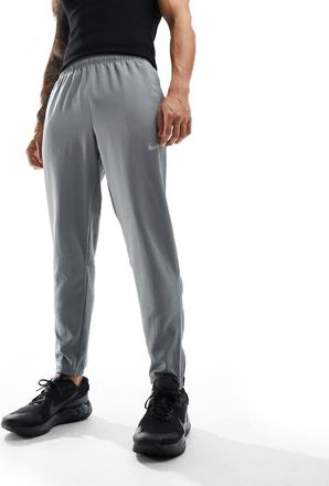 Nike Challenger woven sweatpants in gray