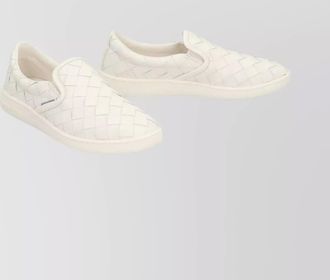 Bottega Veneta leather sneakers featuring woven design