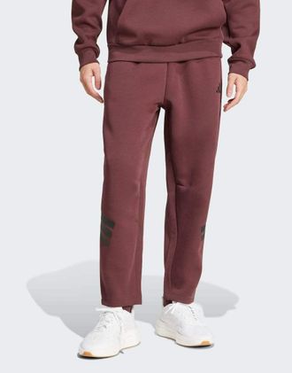 adidas Future icons - Pantaloni marroni e rubino aurora con tasche e 3 strisce-Rosso