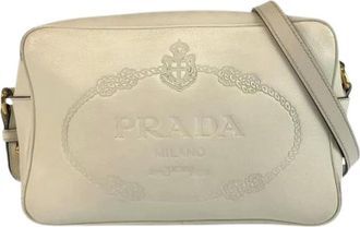 Prada Pre-owned Cross Body Bags, female, Beige, Size: ONE SIZE Pre-owned Logo Embossed Leather Shoulder Bag