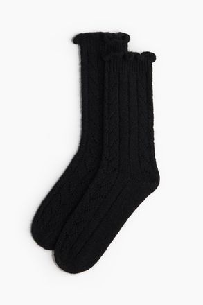 H&M Socken aus Pointellestrick - Schwarz