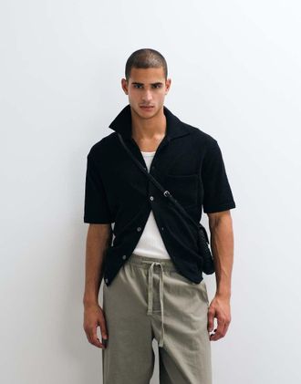 Arket Polo a maniche corte nera in misto cotone-Nero