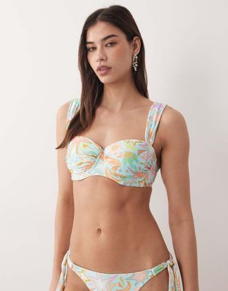 Never Fully Dressed Top bikini con spalline sottili e coppe blu con stampa di sole in coordinato