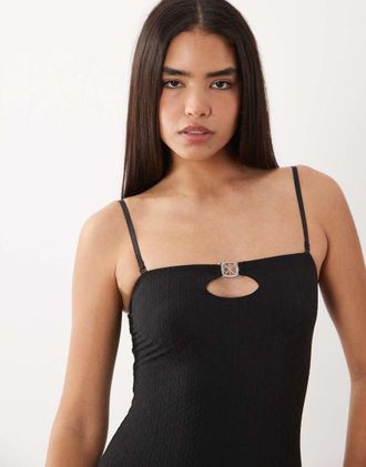 Calvin Klein body cut-out con stampa logo e inserti in metallo argentato nero