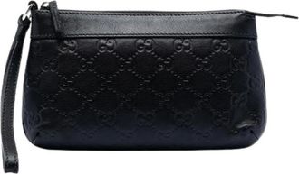 Gucci Pre-owned Clutches, female, Black, Size: ONE SIZE Pre-owned Embossed Leather Clutch