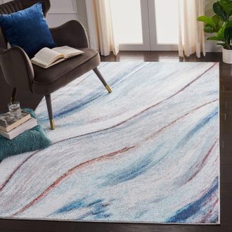 Safavieh Phoenix Machine Made Area rug, Ivory / Blue Contemporary Style Easy Care